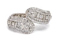 A Vintage Flexible Platinum and Diamond Bypass Bracelet, 51.60 dwts.