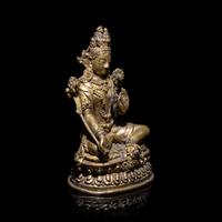 A Tibetan Gilt Bronze Seated Figure of White Tara, 15th/16th Century 十五/十六世紀 西藏銅鎏金白度母像