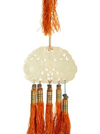 A Pair of Carved Jade Medallion and Tasseled Wall Hangings