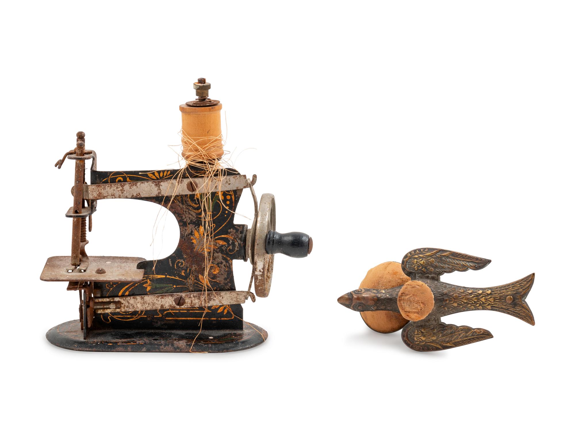 A Sewing Machine-Form Spool Winder and a Brass Sewing Bird
