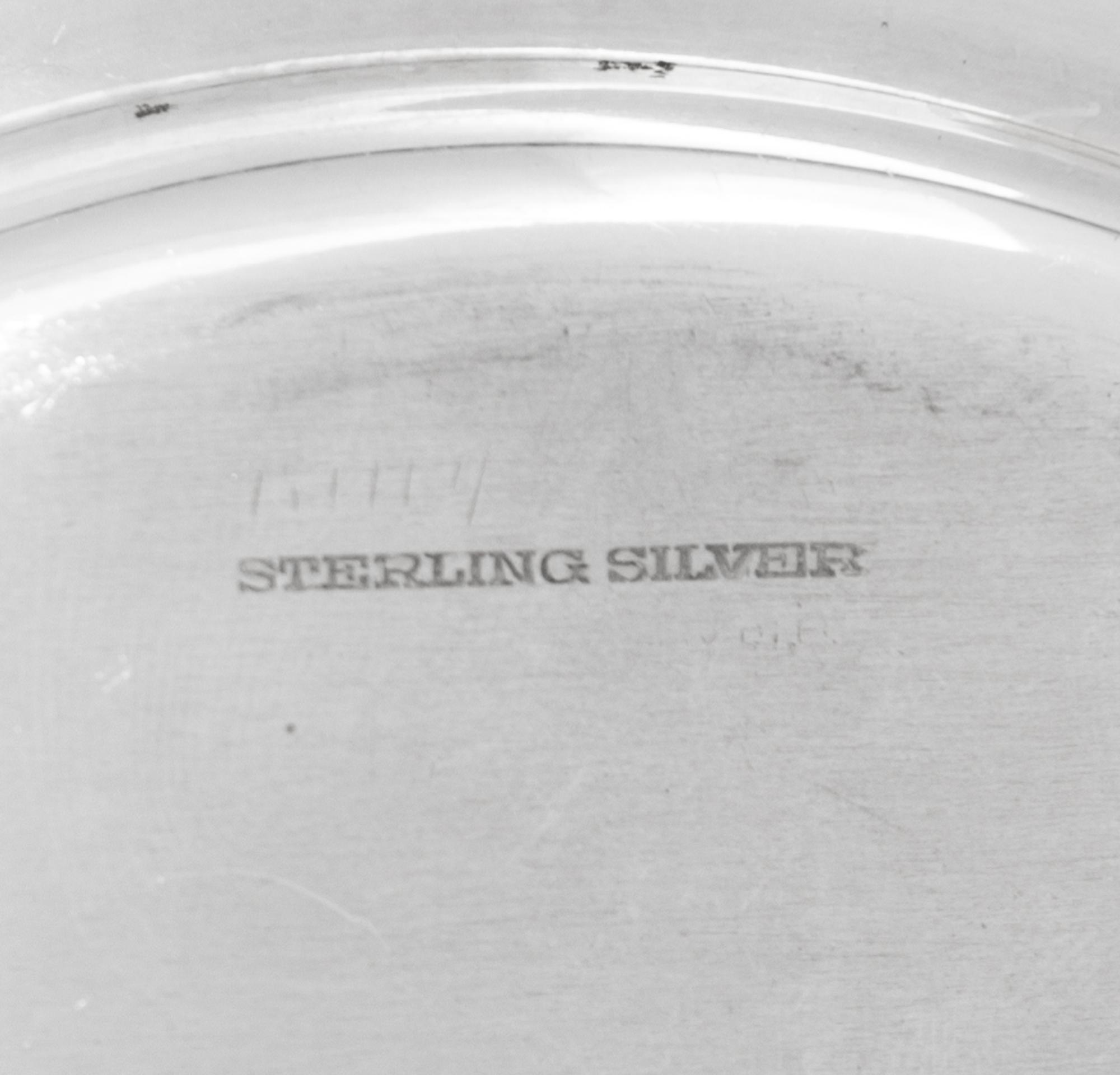 A Set of Twelve American Silver Bread Plates