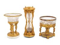 A French Gilt Bronze Mounted Hourglass and Two Associated Figural Centerpiece Bowls