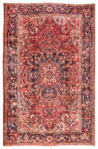 A Heriz Wool Rug 11 feet 6 inches x 8 feet 7 inches. — CIRCA 1930