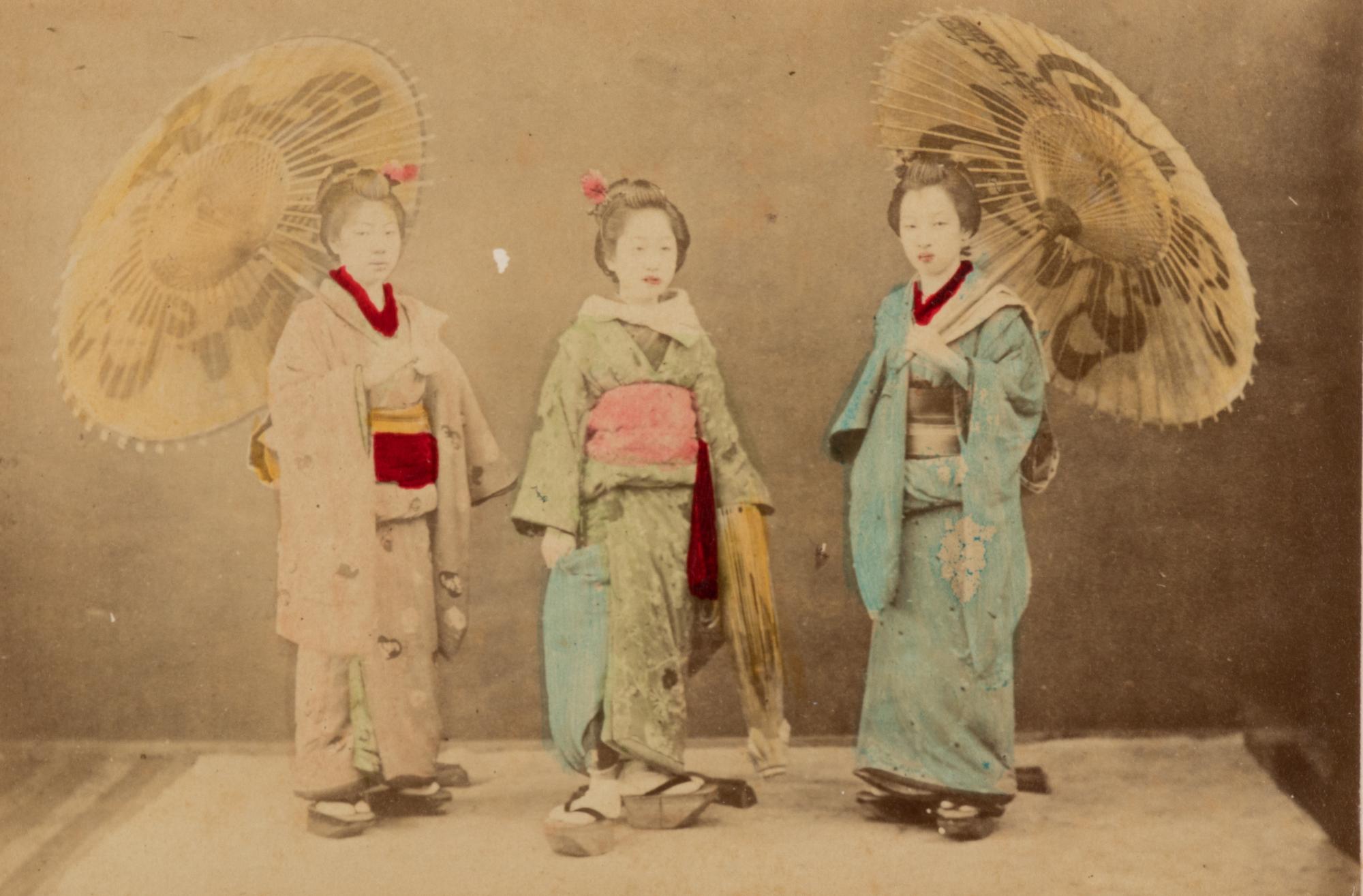 Four Japanese Hand Tinted Photographs