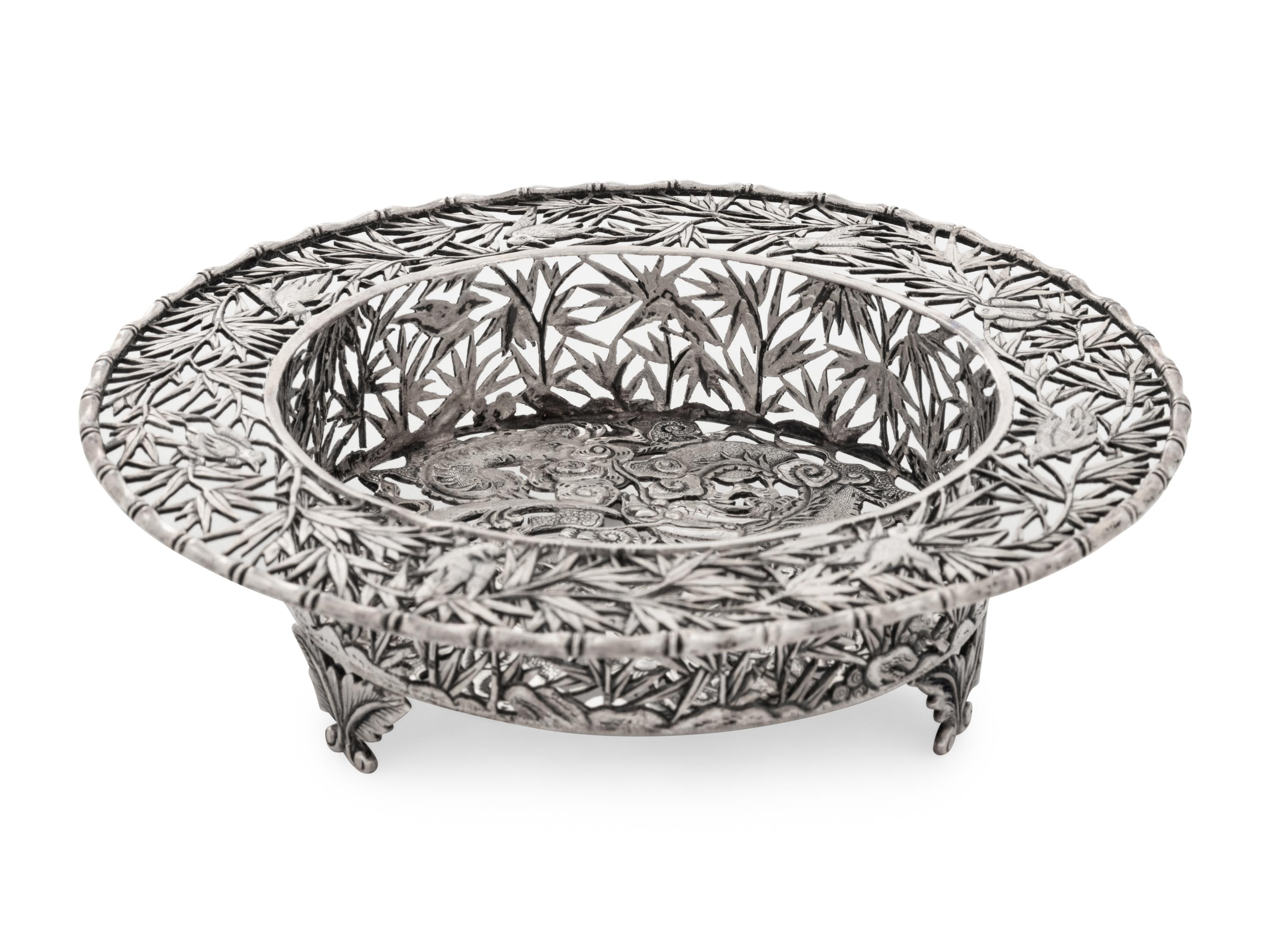 A Chinese Export Silver Tripod Dish