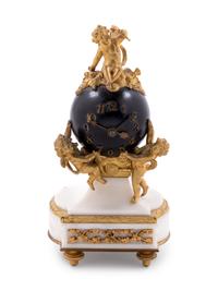 A French Gilt and Patinated Bronze Table Clock