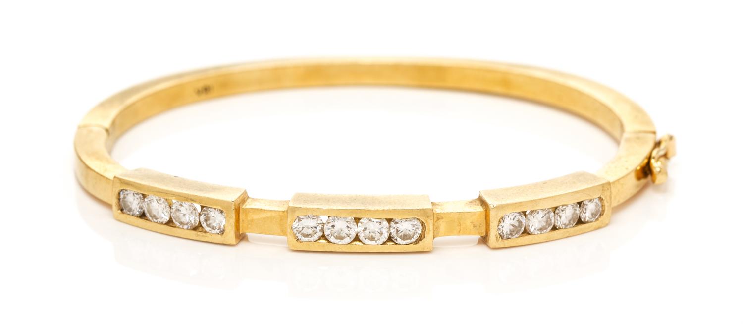 An 18 Karat Yellow Gold and Diamond Bangle Bracelet, 17.60 dwts.