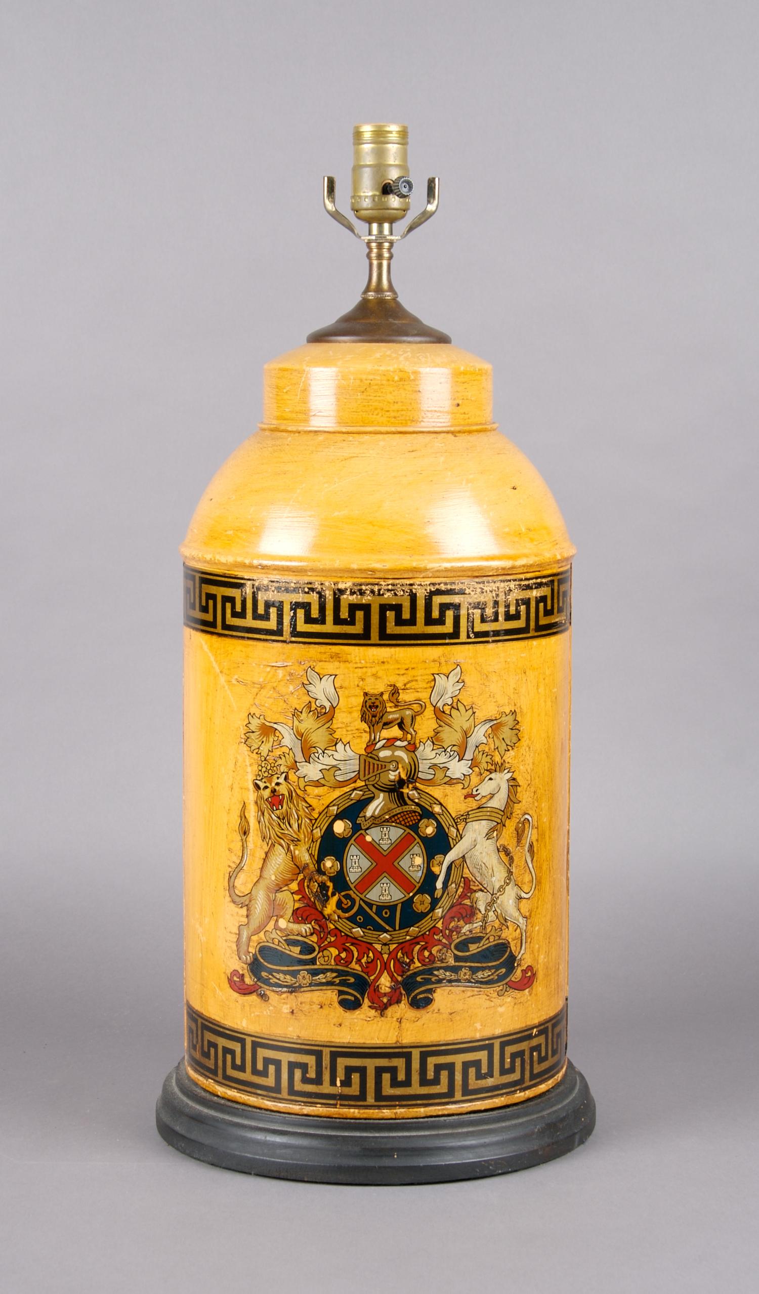 A Painted Tole Cannister Mounted as a Lamp, Height overall 23 inches.