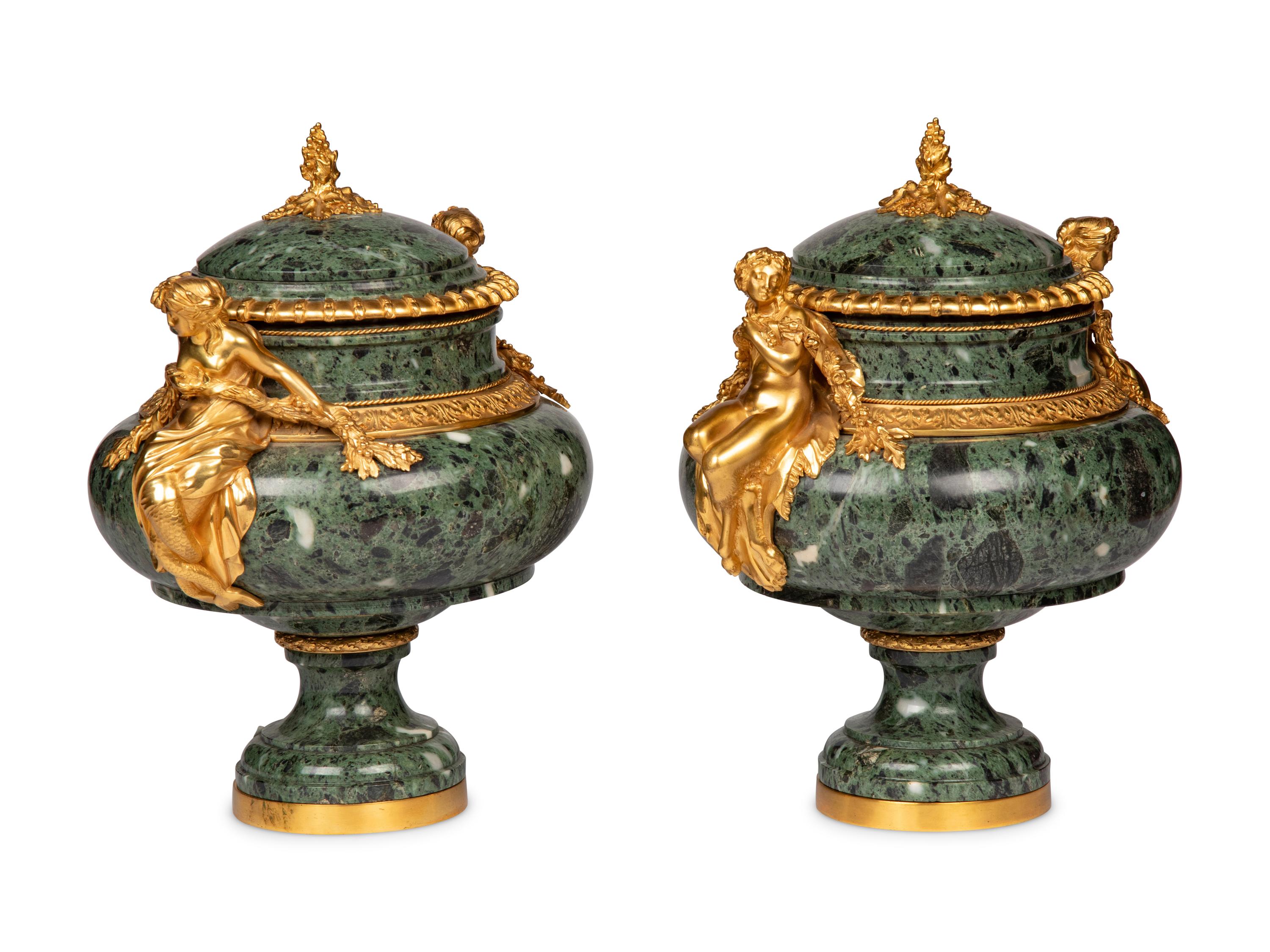 A Pair of French Gilt Bronze Mounted Marble Urns