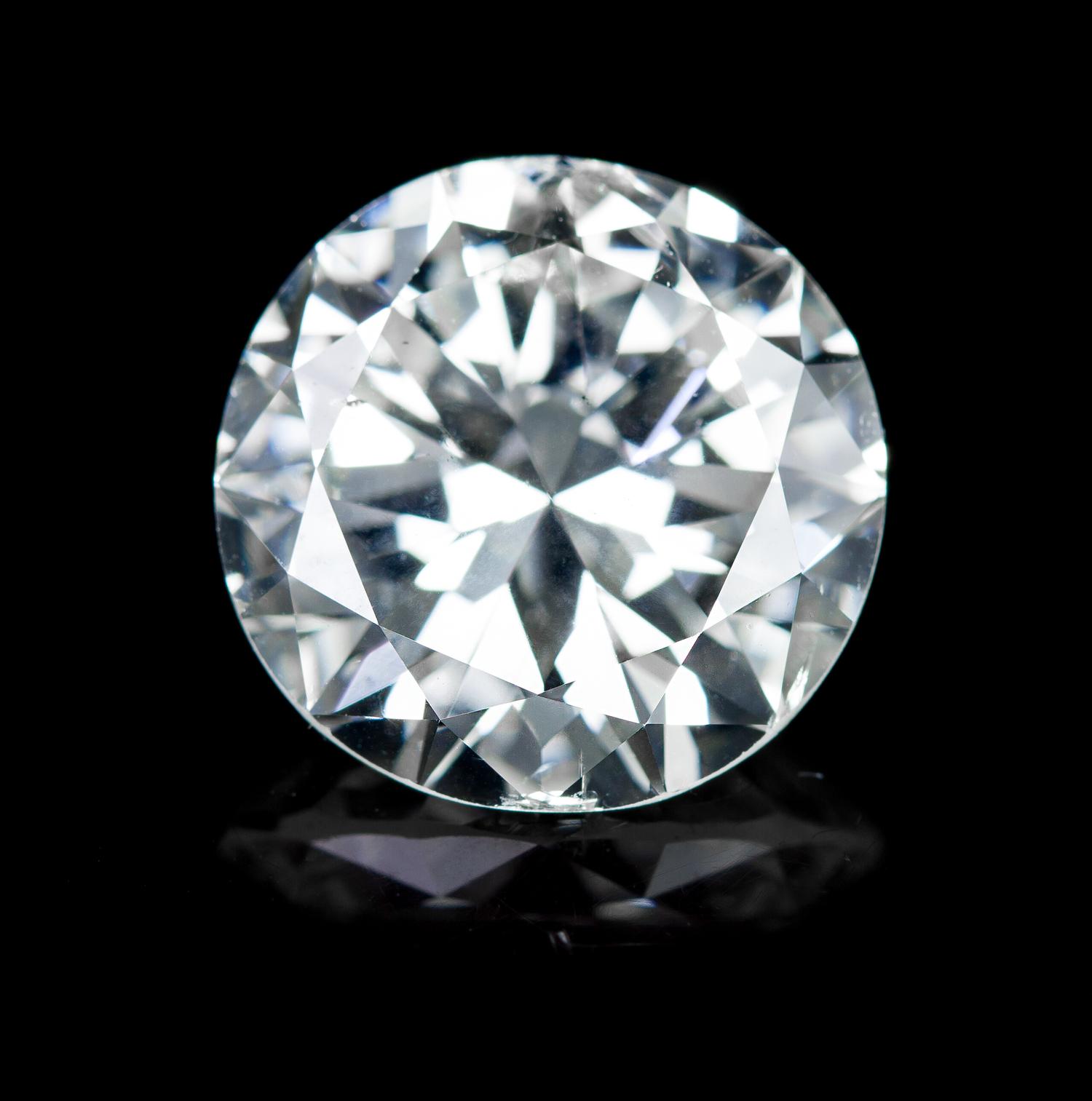A Platinum and Round Brilliant Cut Diamond Ring, 6.20 dwts.