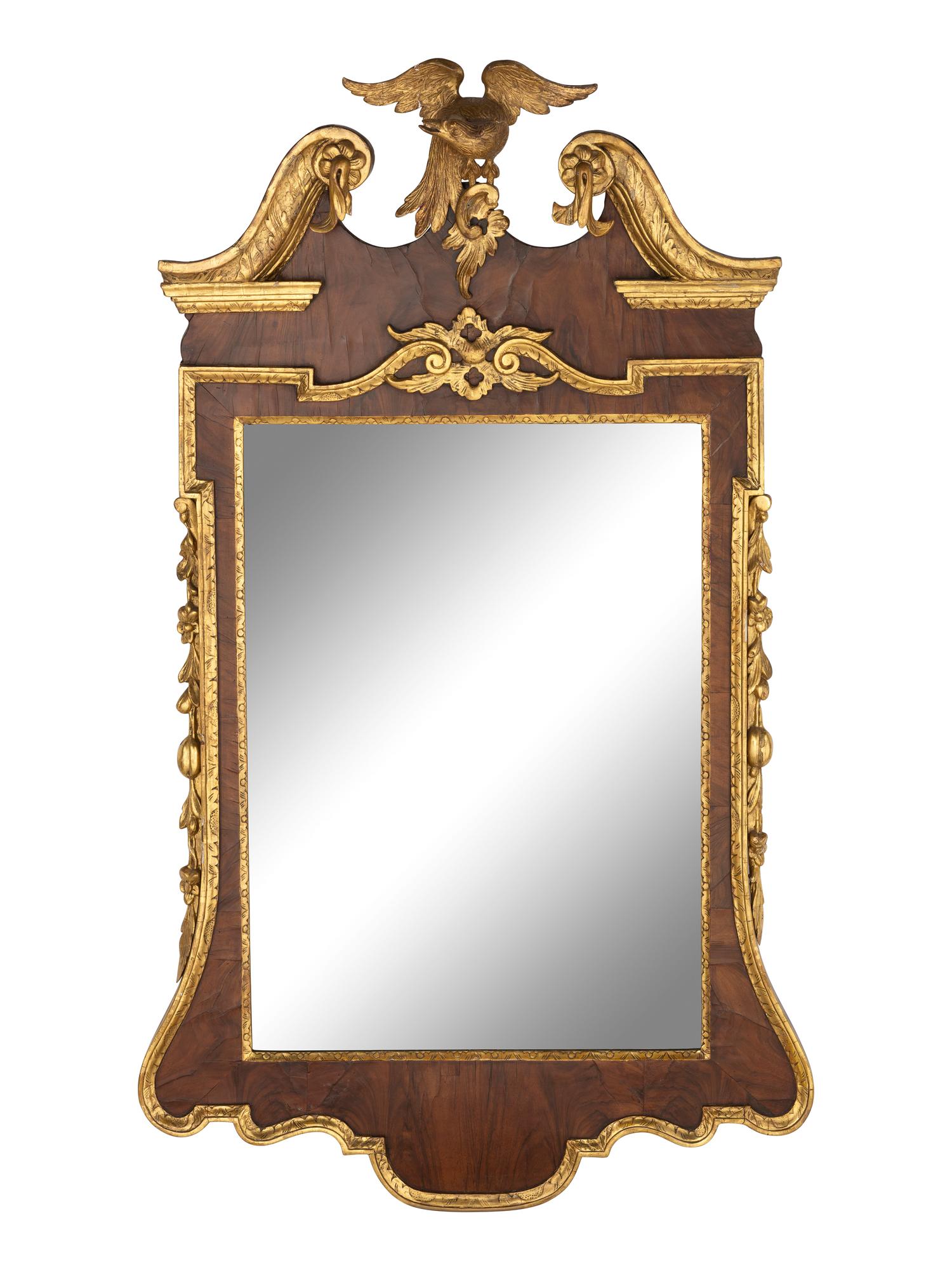 A Chippendale Walnut Veneered and Parcel Gilt Looking Glass