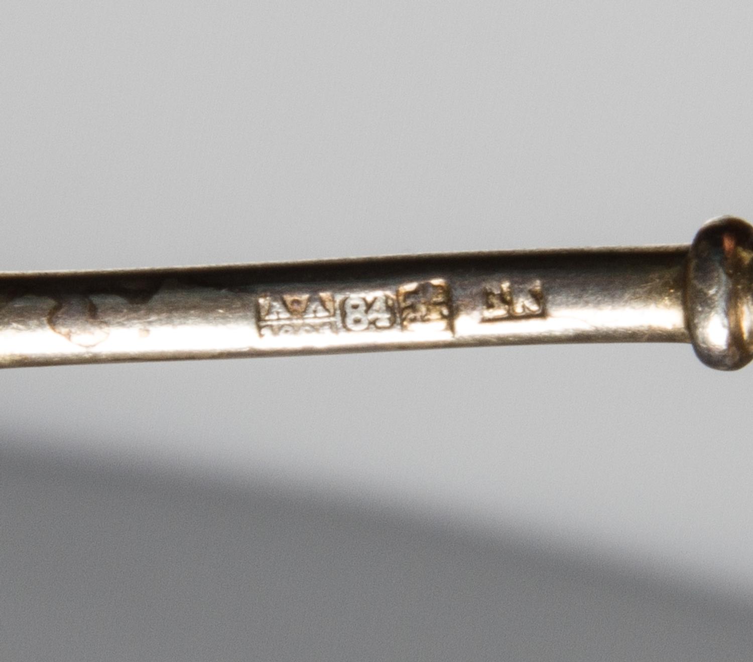 A Russian Silver-Gilt and Enamel Spoon, Maker's mark obscured, assay mark of Anatoly Artsybashev, Moscow, 19th century, the top and und