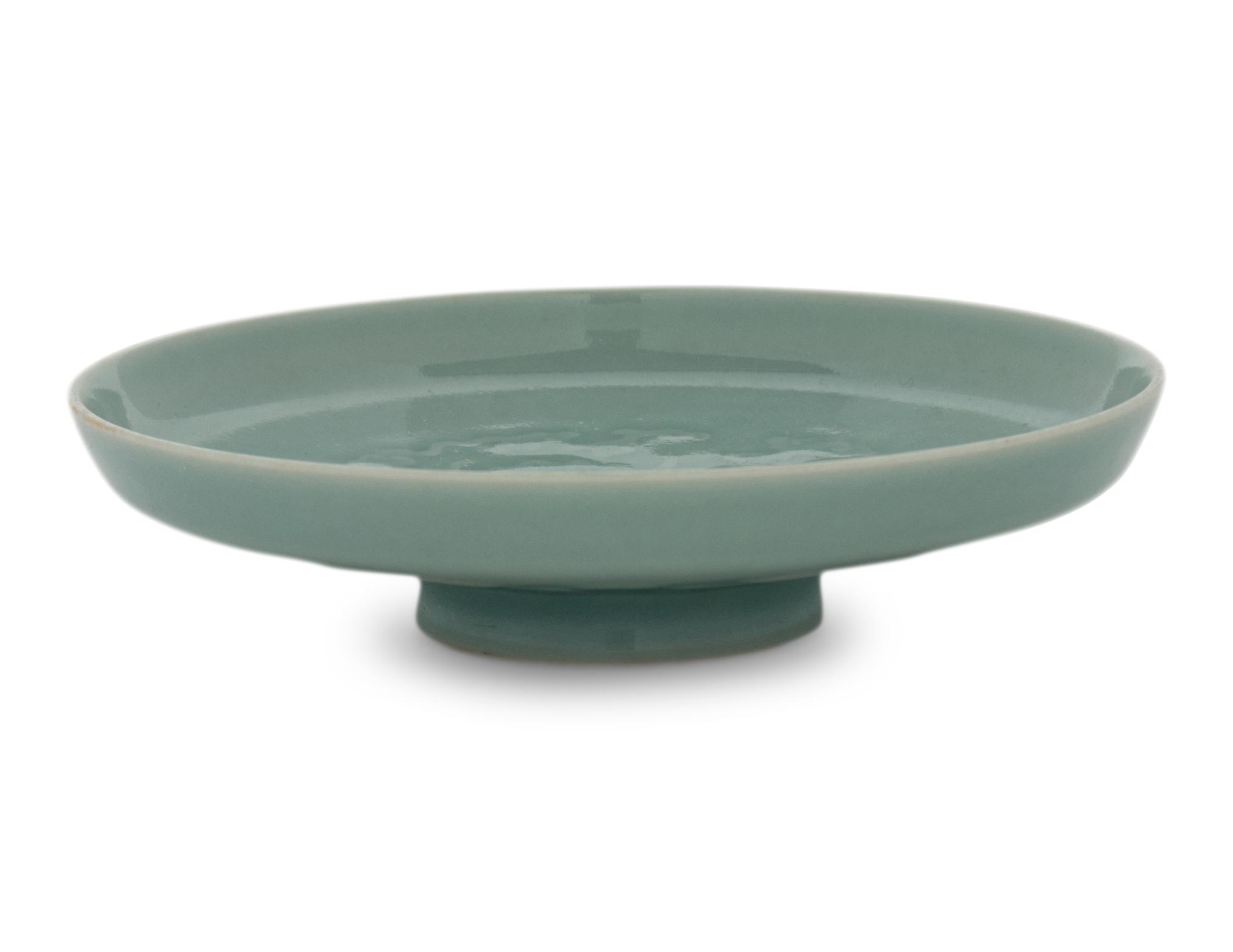 A Celadon Glazed Porcelain Ink Palette 乾隆款 粉青釉福祿萬代紋筆舔