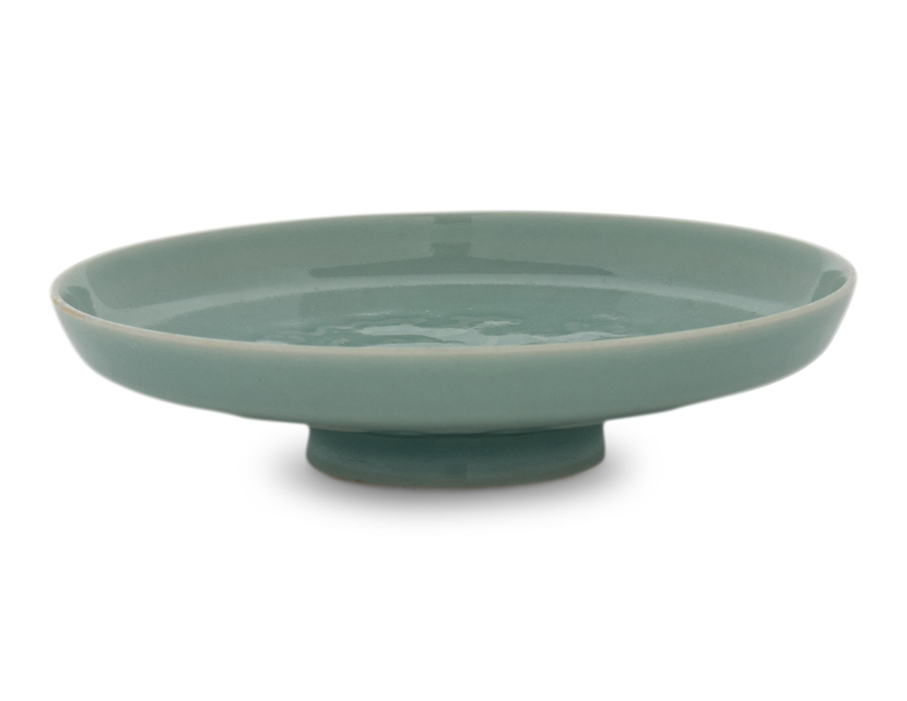 A Celadon Glazed Porcelain Ink Palette 乾隆款 粉青釉福祿萬代紋筆舔