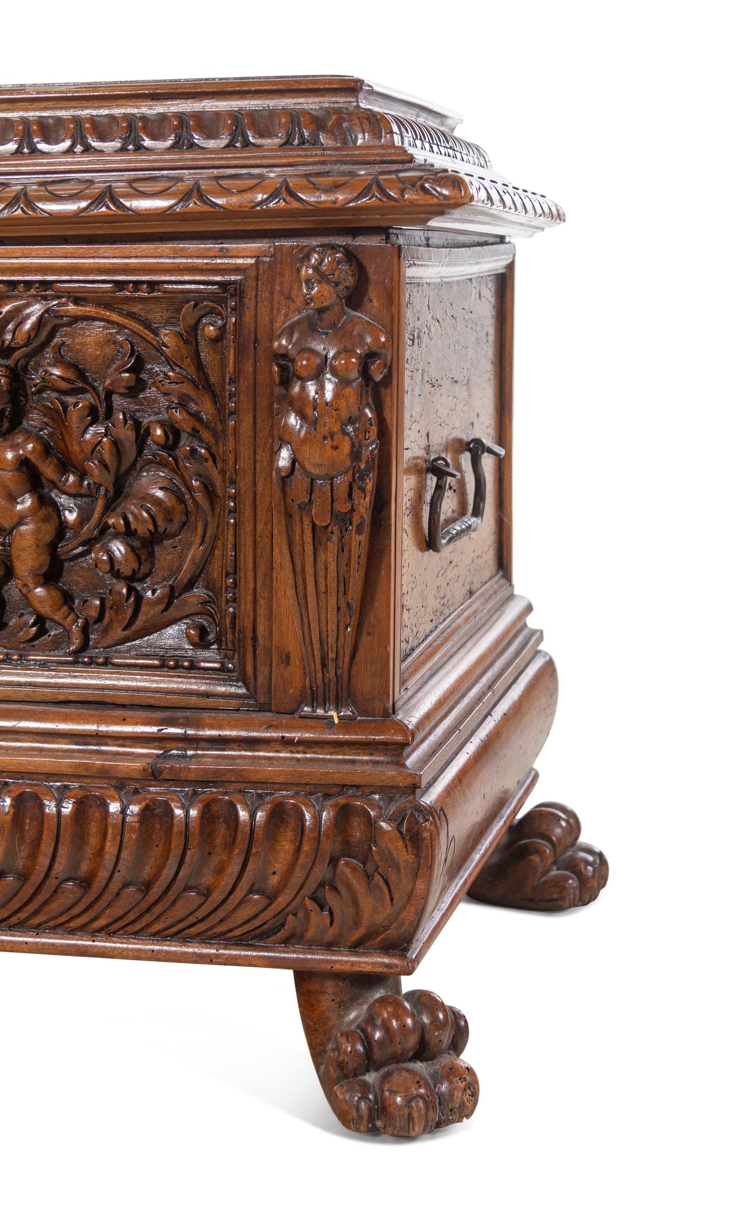 An Italian Carved Walnut Cassone