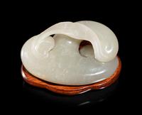 A Pale Celadon and Russet Jade Carving of a Lingzhi Fungus