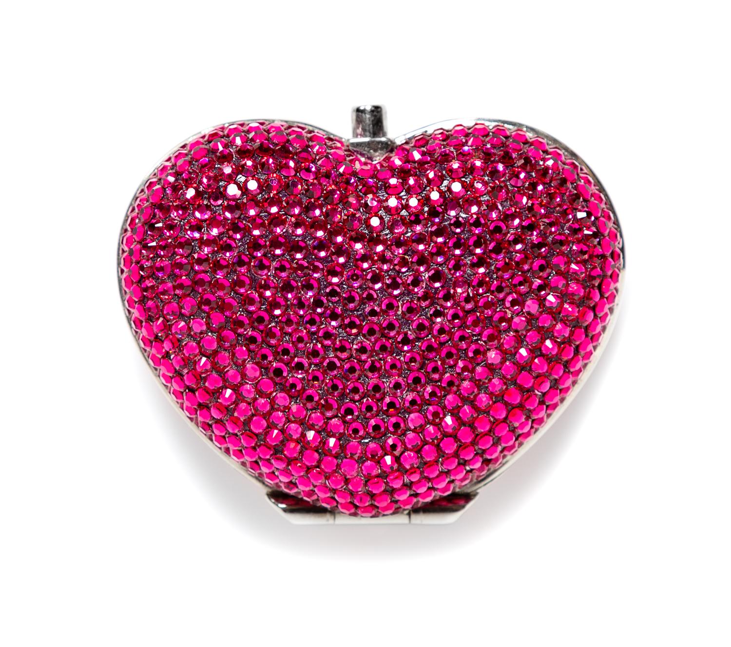 A Judith Leiber Pink Crystal Heart Pill Box, 2" L x 2.5" W.