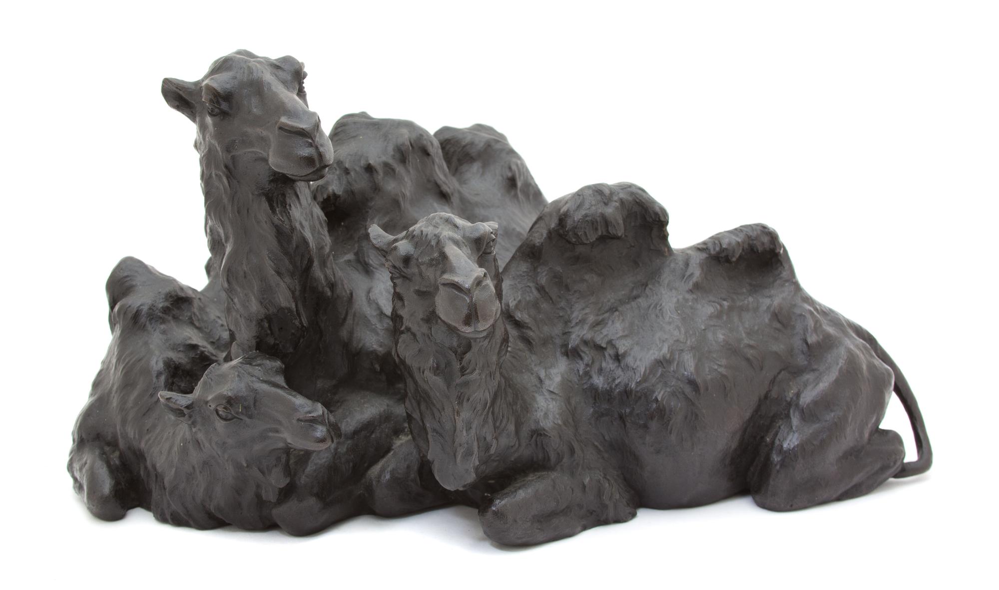 A Bronze Sculpture of Three Recumbent Bactrian Camels Height 8 1/2 x width 15 xdepth 12 1/2 inches. — 20TH CENTURY