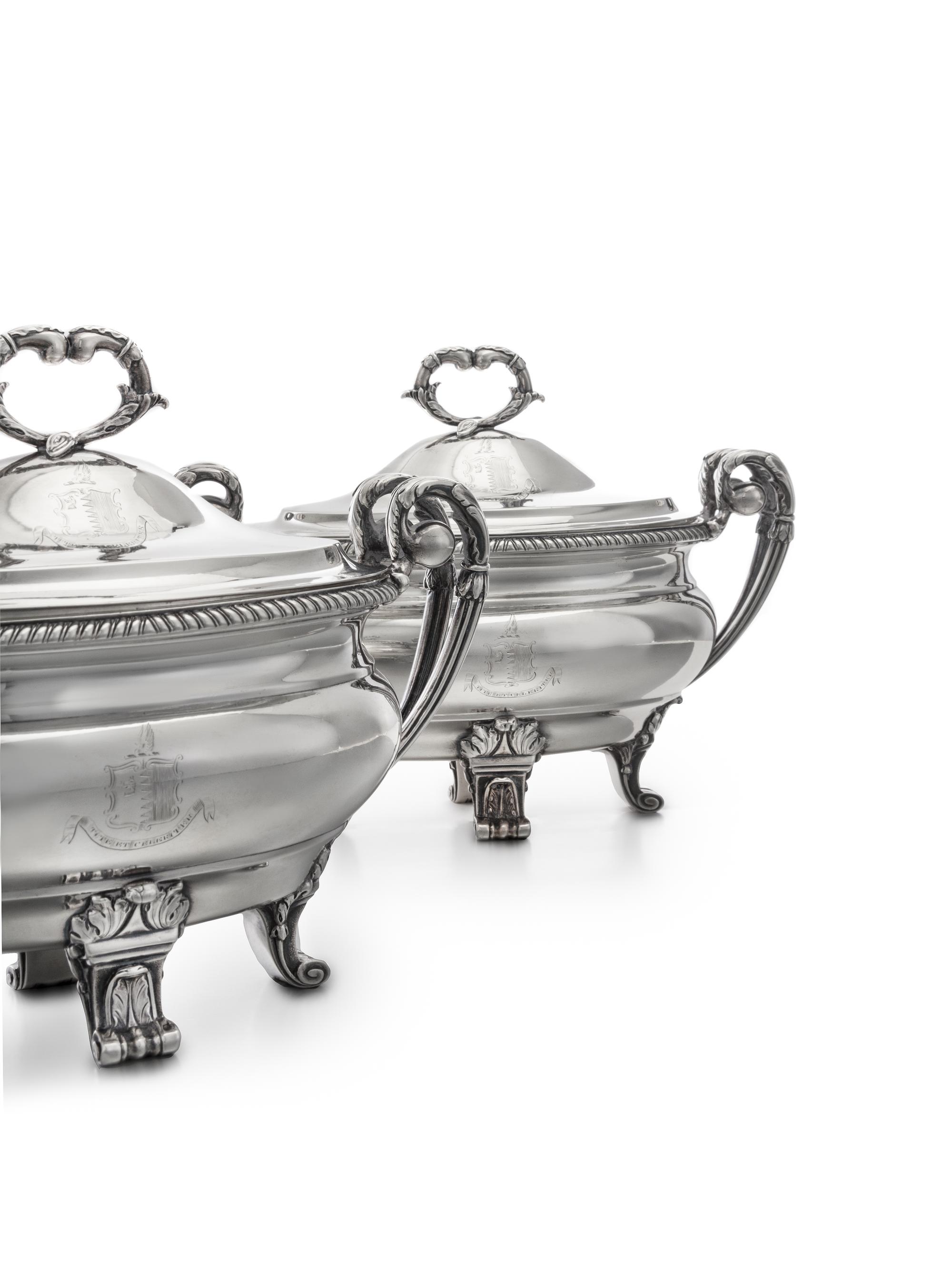 A Pair of George III Silver Sauce Tureens, Paul Storr, London, 1799, each domed lid having an addorsed foliate C-scroll finial and engr