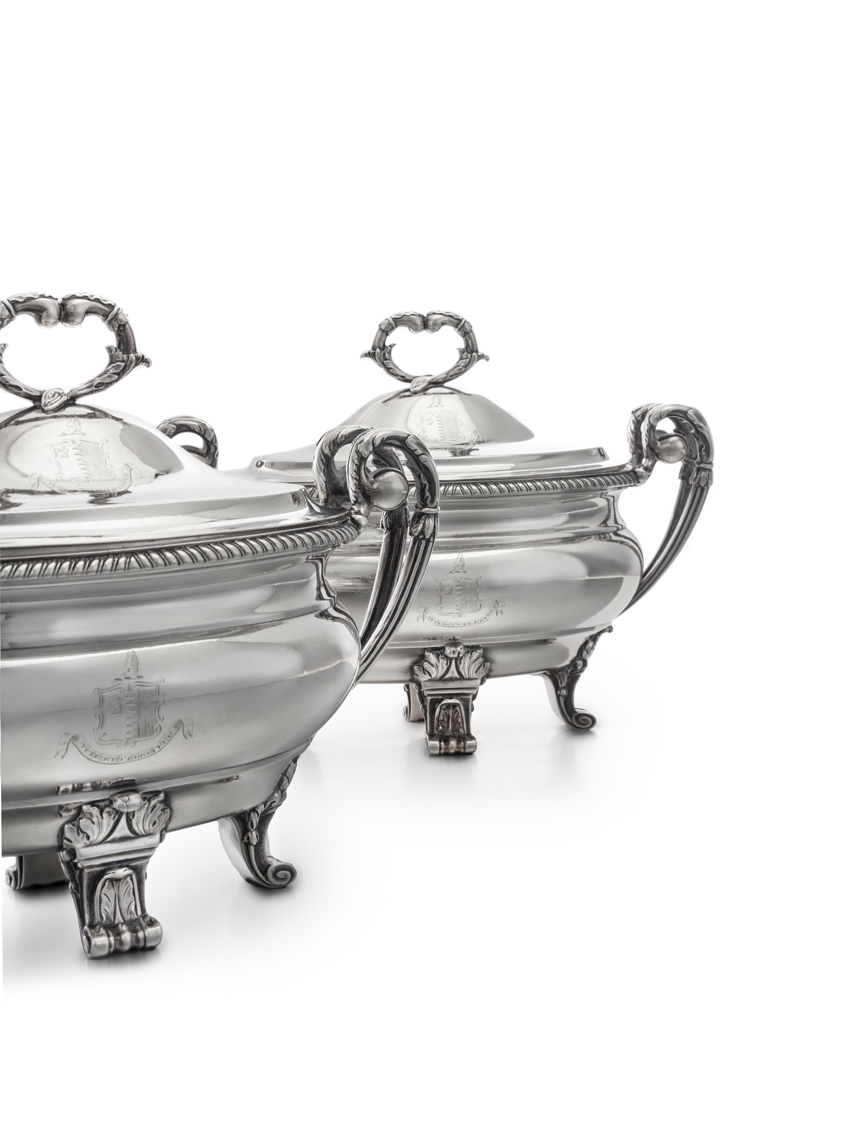 A Pair of George III Silver Sauce Tureens, Paul Storr, London, 1799, each domed lid having an addorsed foliate C-scroll finial and engr
