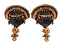 A Pair of Italian Parcel Gilt and Ebonized Wall Brackets