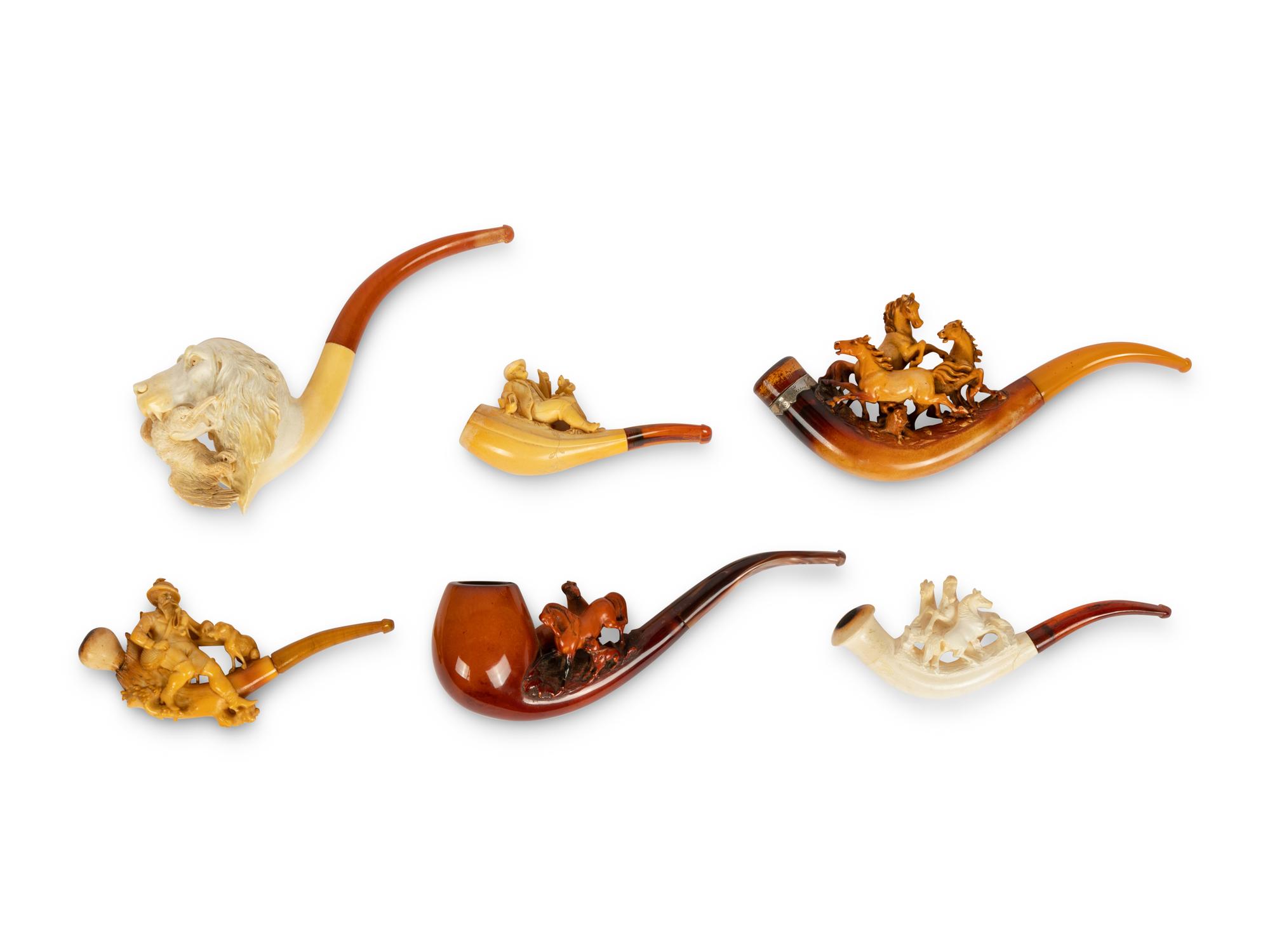 A Group of Six Carved Meerschaum Pipes