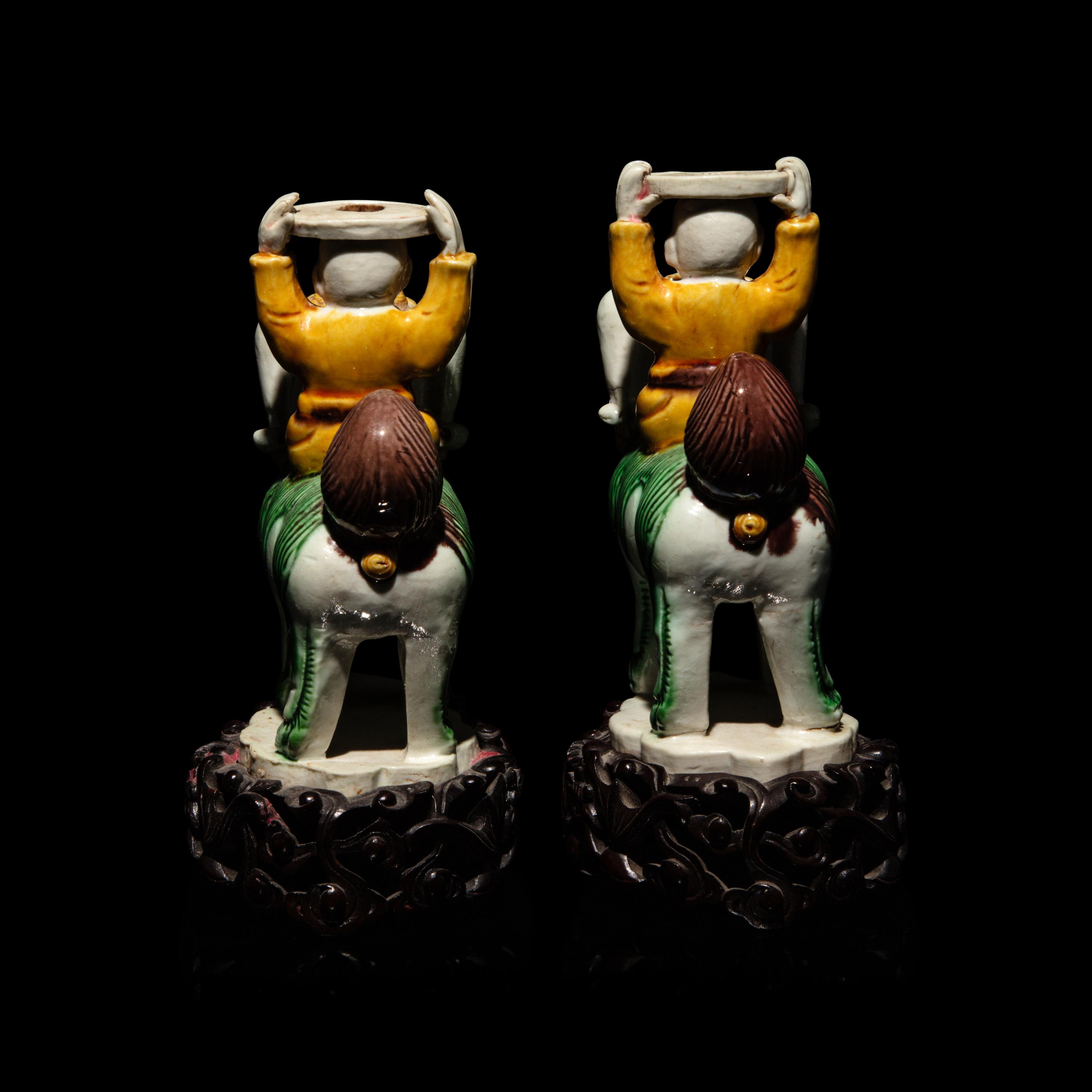 A Pair of Small Chinese Enameled Figures on Lions