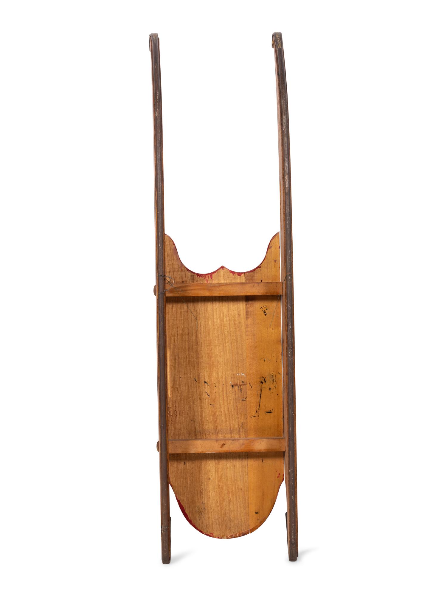 A Painted and Stenciled Wood "Rocket" Sled