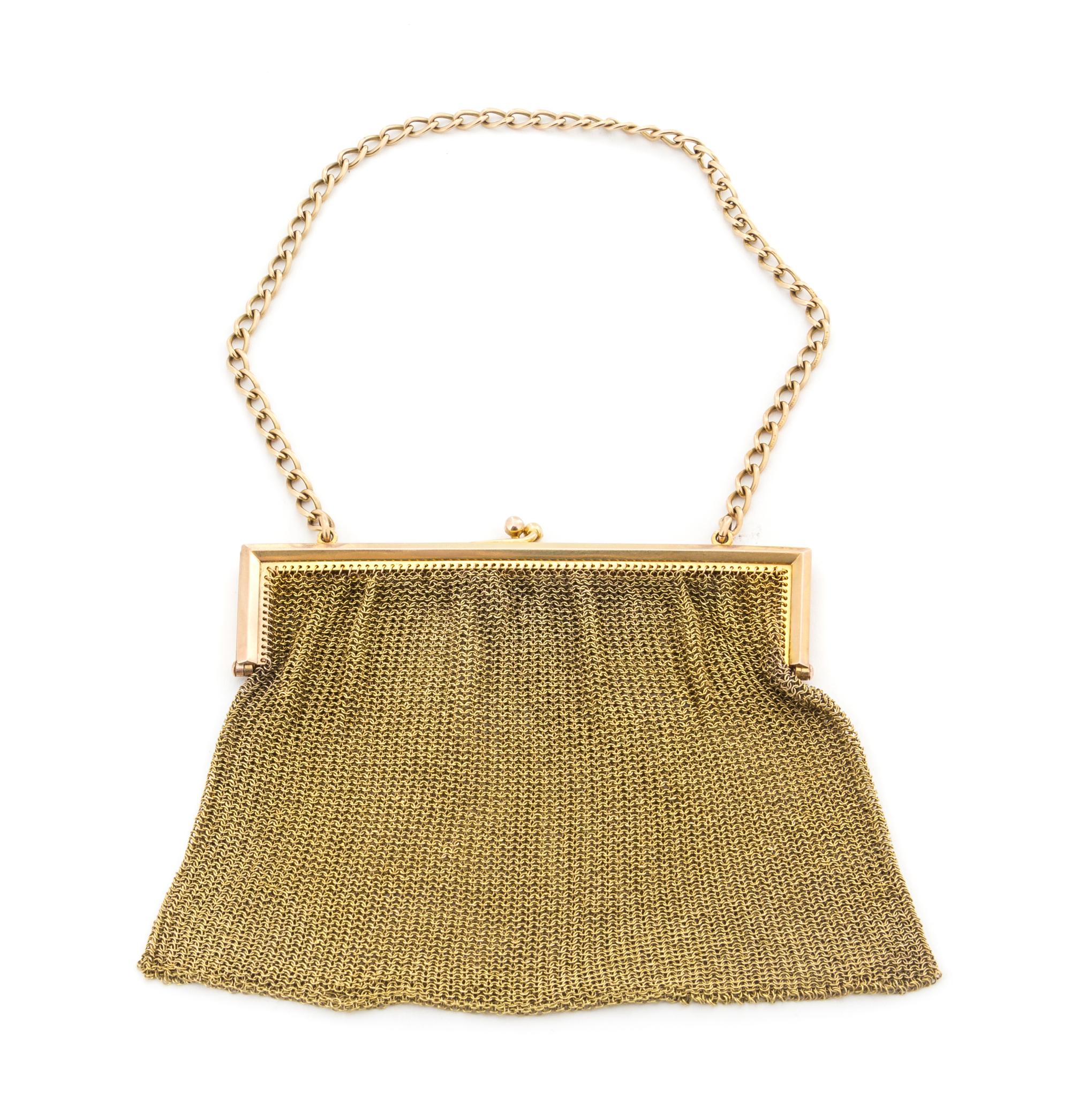 A 15-Karat Gold Purse, , having a chain-mail bag with a chain-link handle.