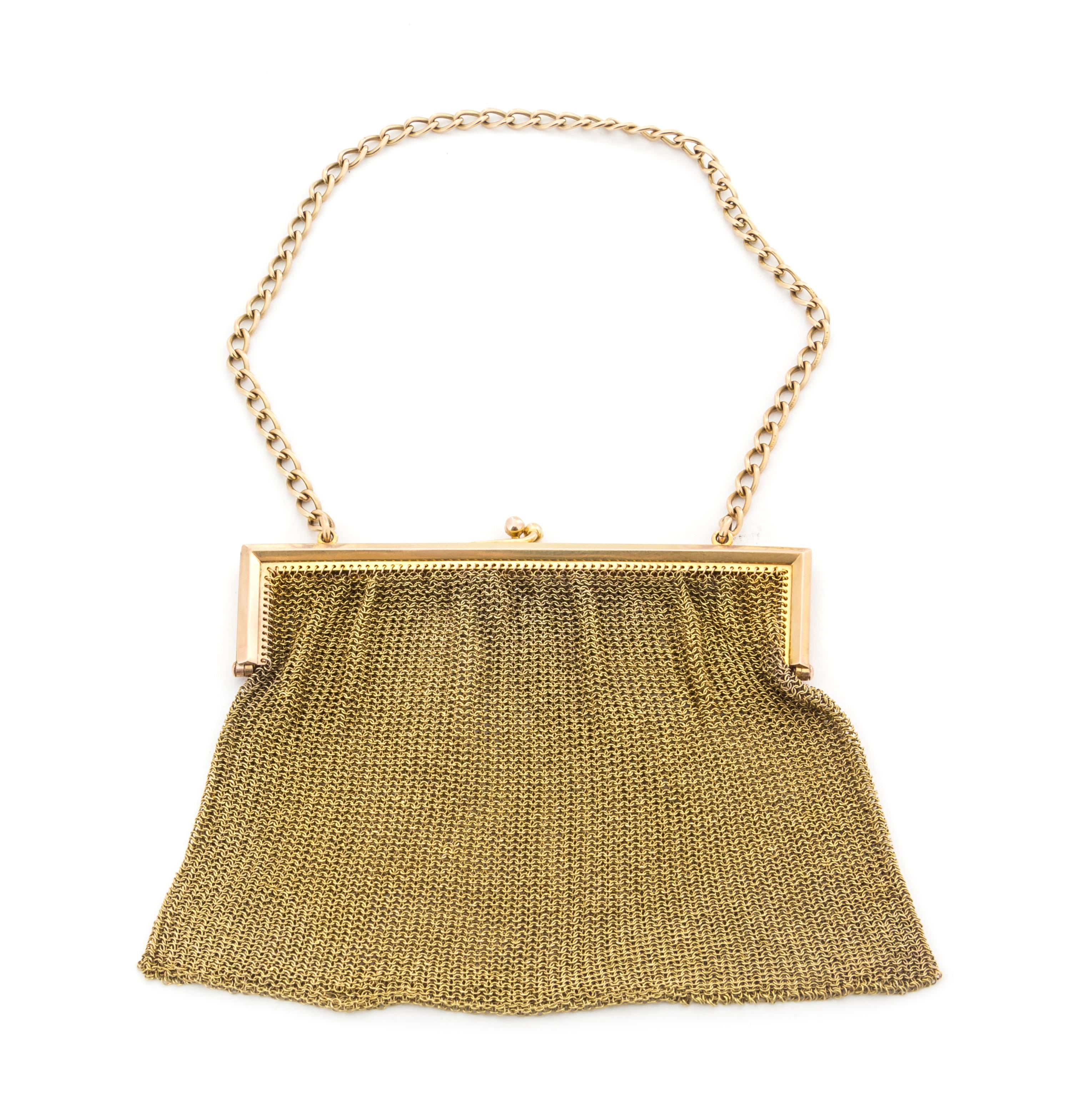 A 15-Karat Gold Purse, , having a chain-mail bag with a chain-link handle.