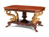 A North European Neoclassical Parcel Gilt Mahogany Center Table