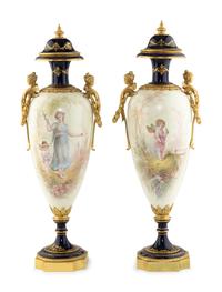 A Pair of Gilt Bronze Mounted Sèvres Style Porcelain Urns