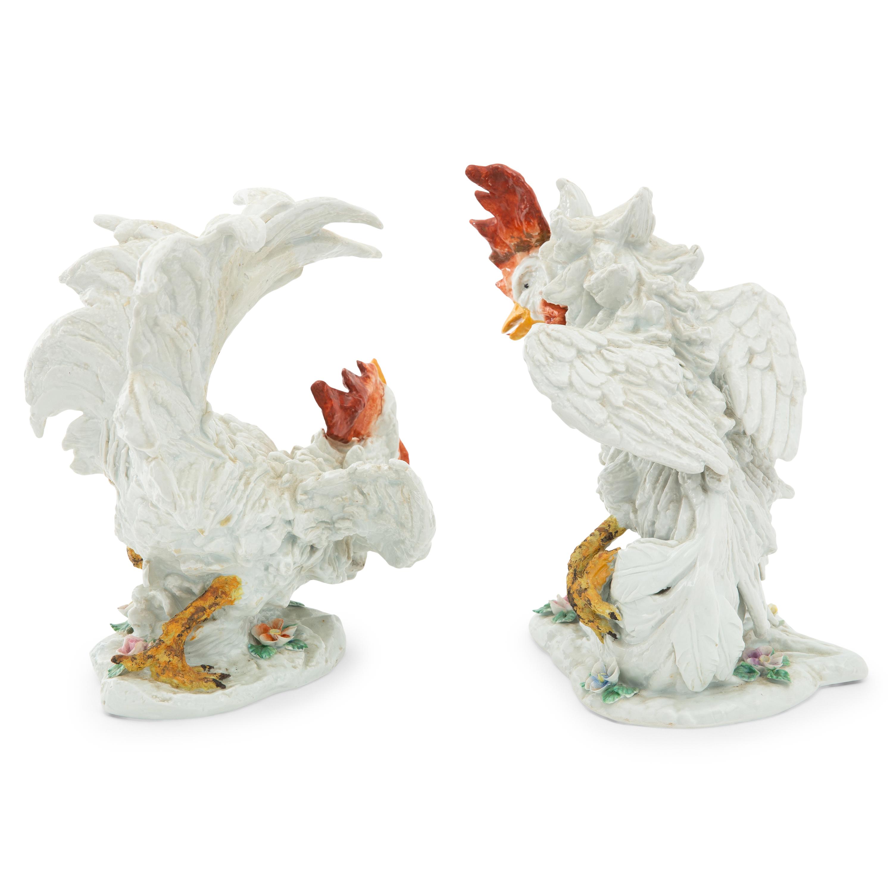 A Pair of Sevres Style Porcelain Models of Fighting Cockerels
