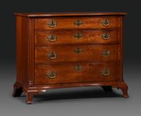 A Chippendale Carved Cherrywood Reverse-Serpentine Chest of Drawers