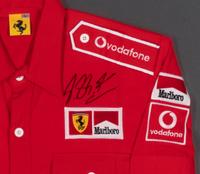 A Michael Schumacher Signed Autograph Ferrari Crew Shirt Display