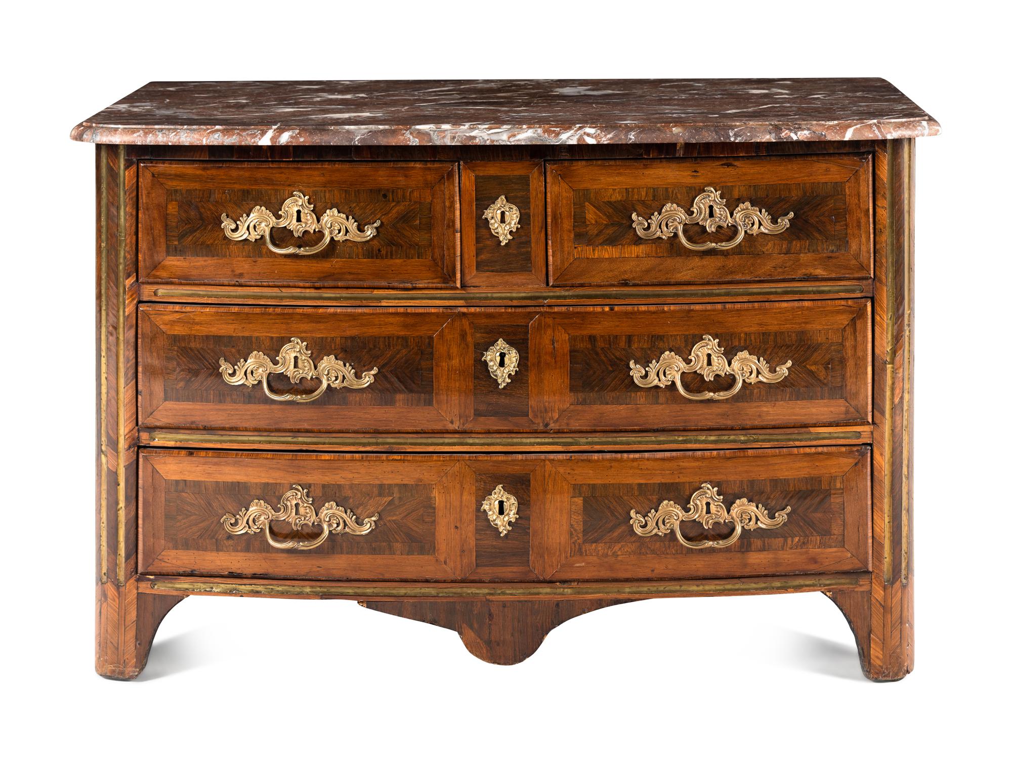 A Régence Gilt Bronze Mounted Marble-Top Commode