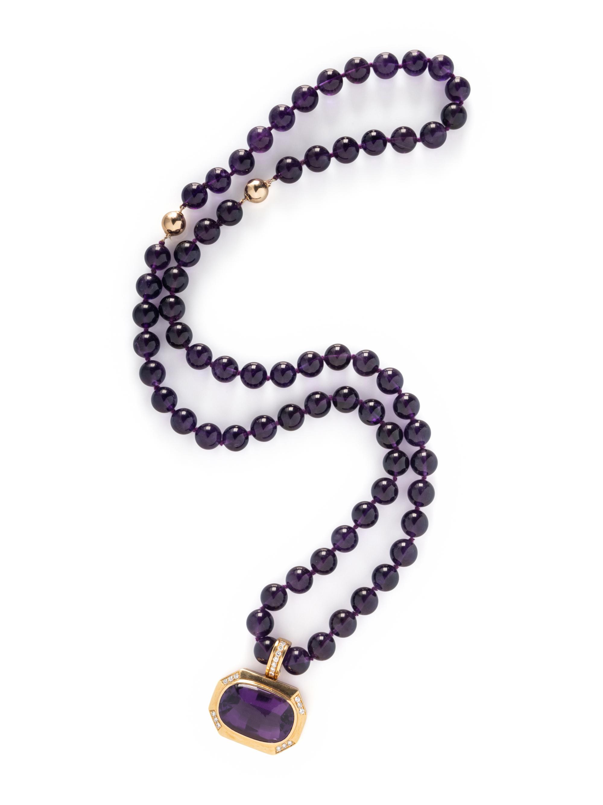 GUMPS, CONVERTIBLE AMETHYST AND DIAMOND PENDANT NECKLACE