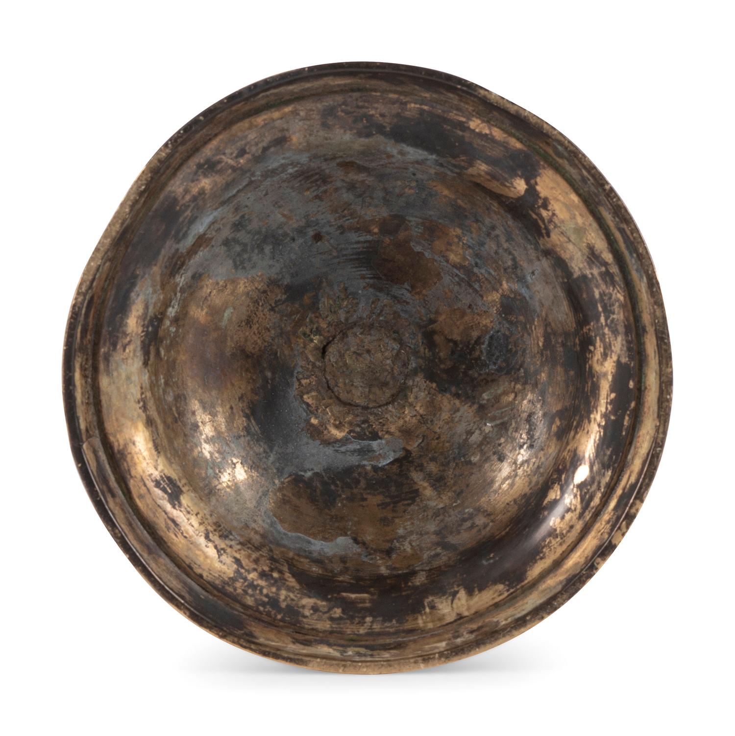 A Dutch Brass Heemskerk Candlestick