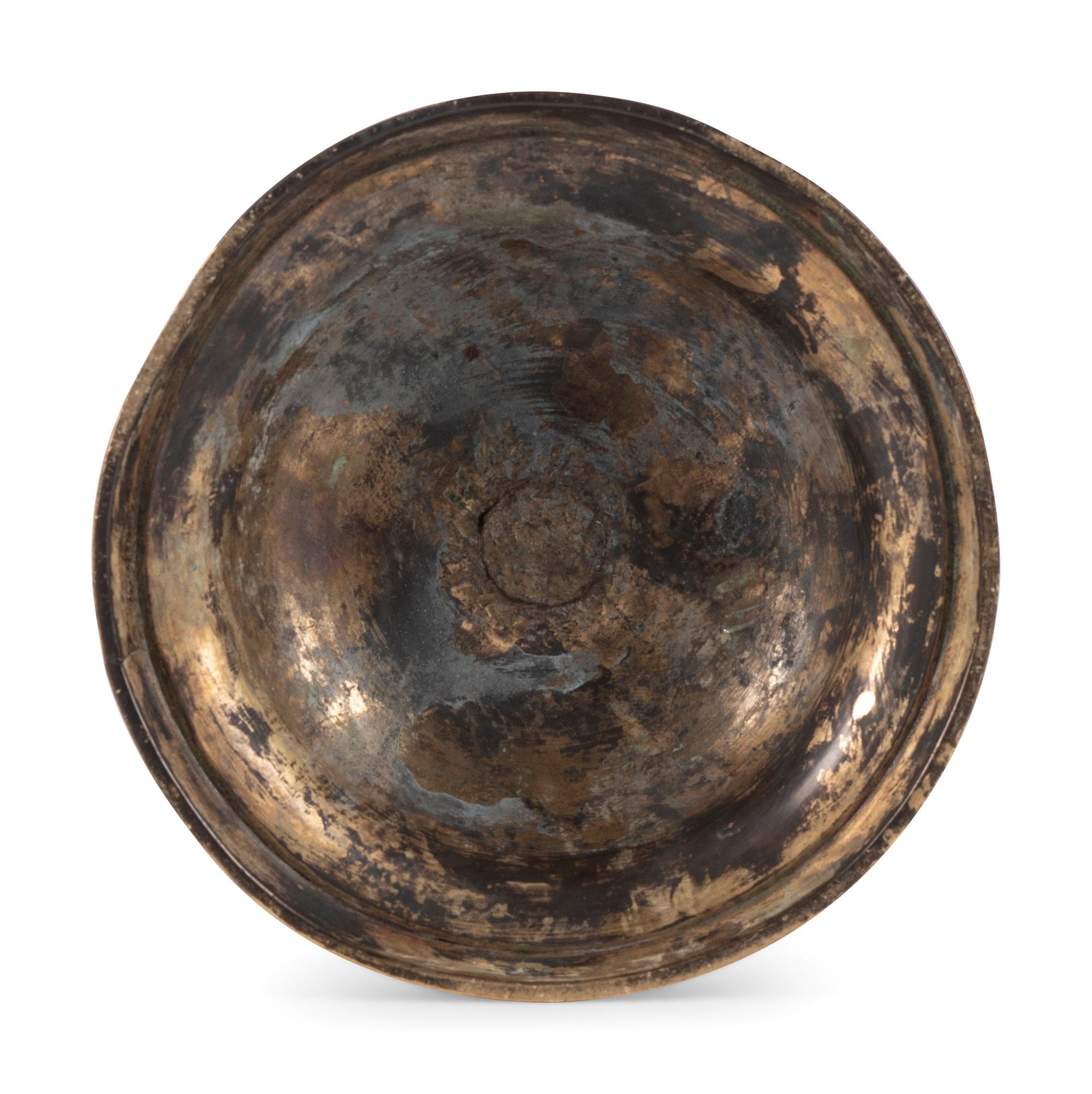 A Dutch Brass Heemskerk Candlestick