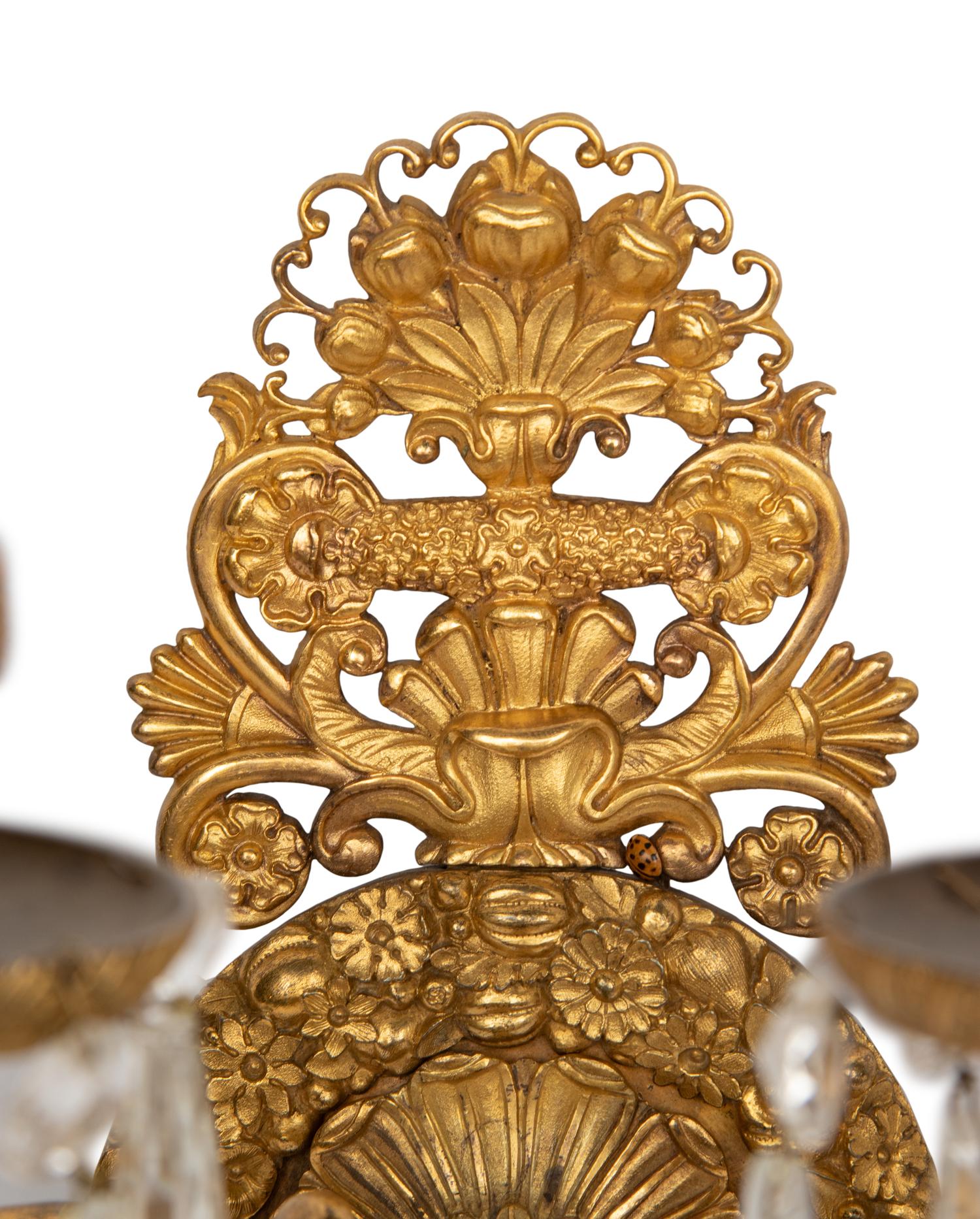 A Pair of Empire Style Gilt Bronze Four-Light Sconces