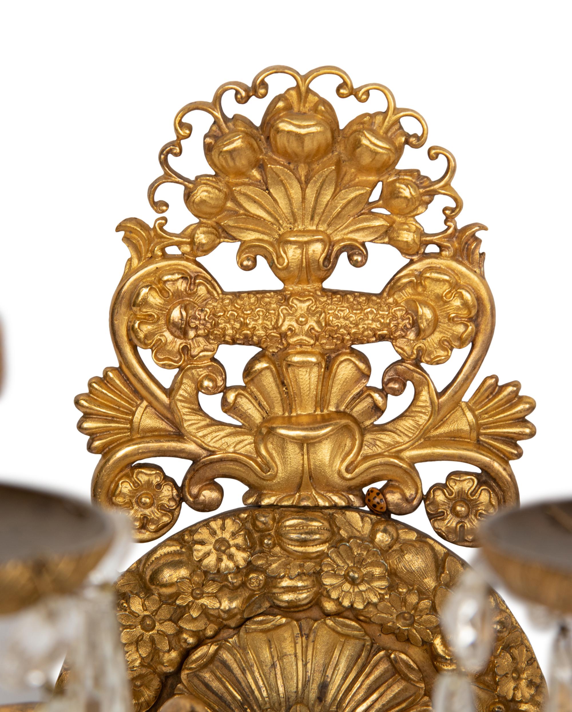 A Pair of Empire Style Gilt Bronze Four-Light Sconces