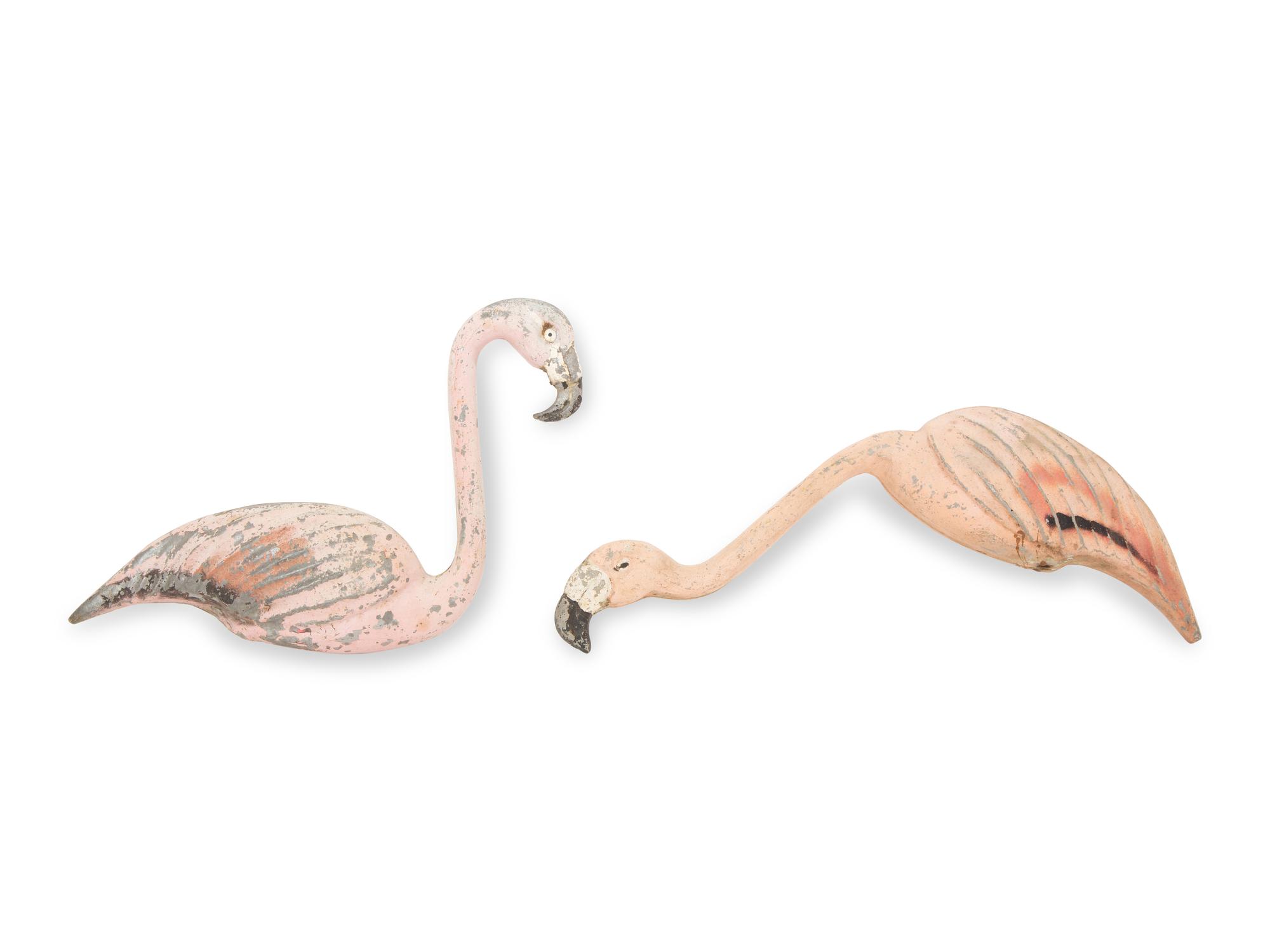 A Tole Peint Model of Two Flamingos and a Glazed Earthenware Model of a Flamingo