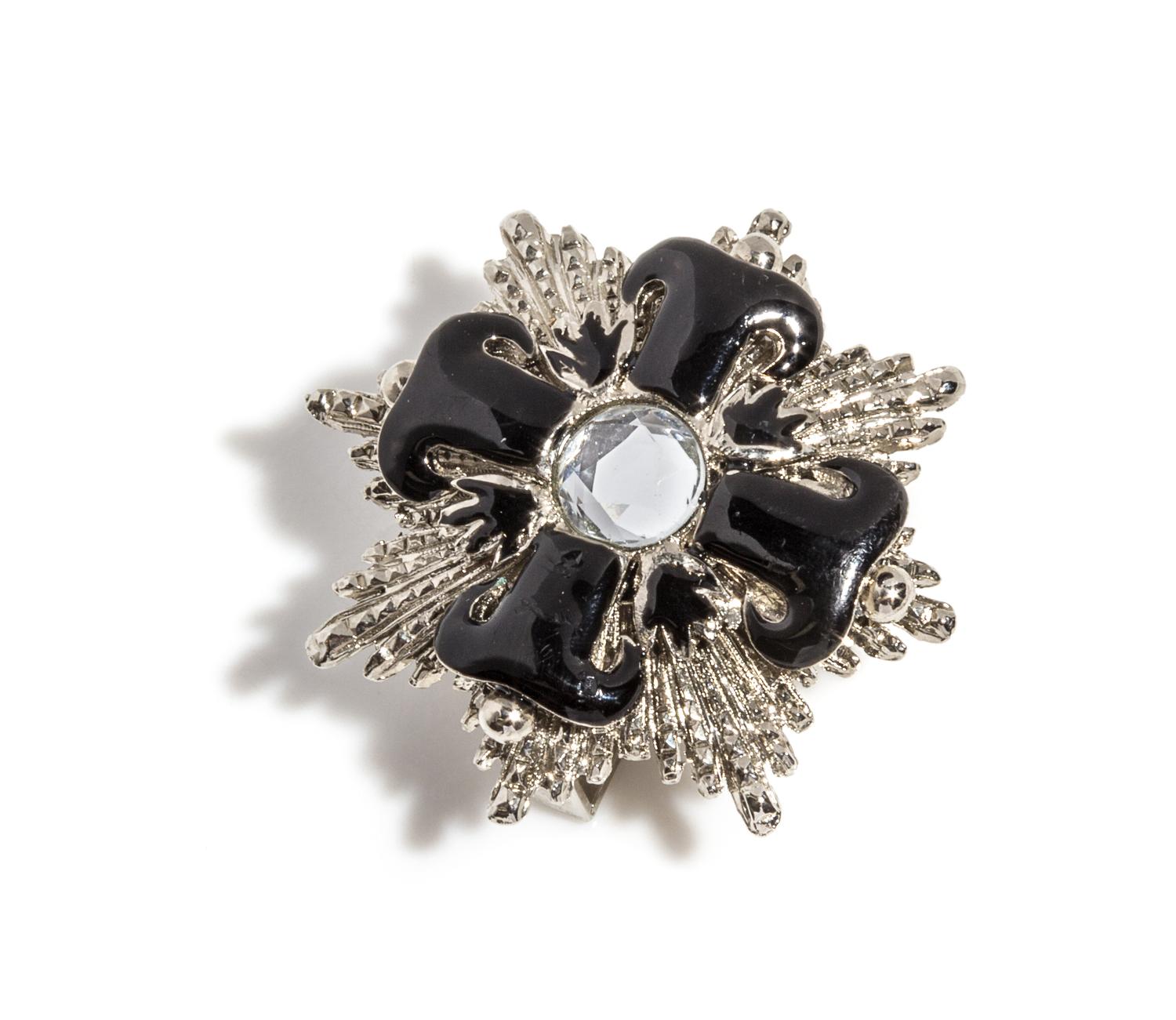 A Gianni Versace Black and Silvertone Belt Slide,