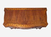 A Rococo Burr Walnut and Fruitwood Commode