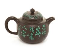 A Yixing Pottery Teapot Height 3 1/4 inches.