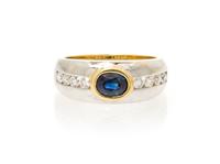 An 18 Karat Gold, Sapphire and Diamond Ring, 6.90 dwts.
