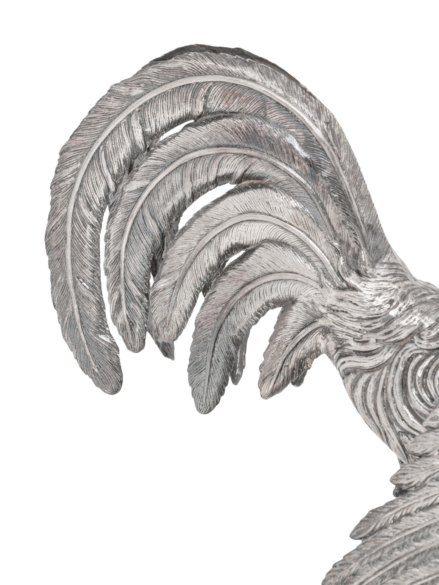 A Pair of Spanish Silver Cockerels