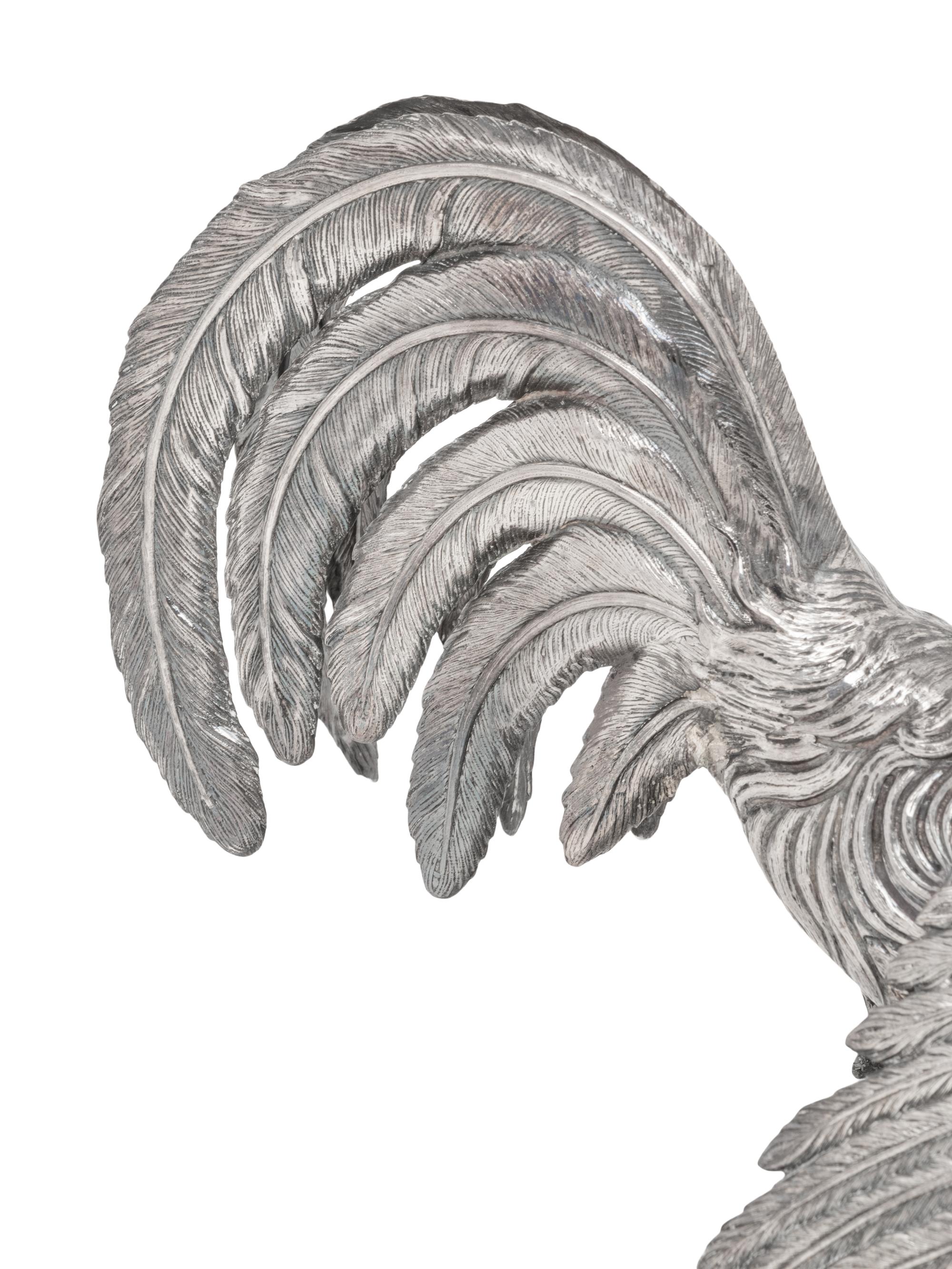 A Pair of Spanish Silver Cockerels