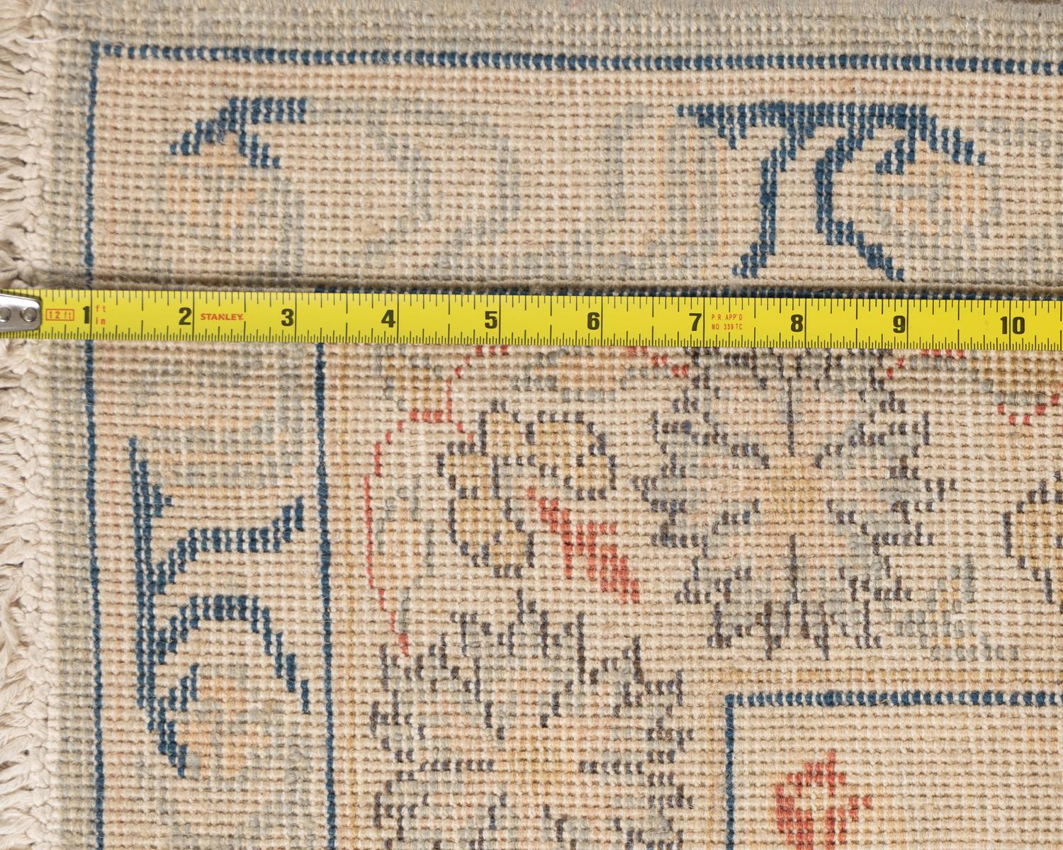 An Agra Style Wool Rug