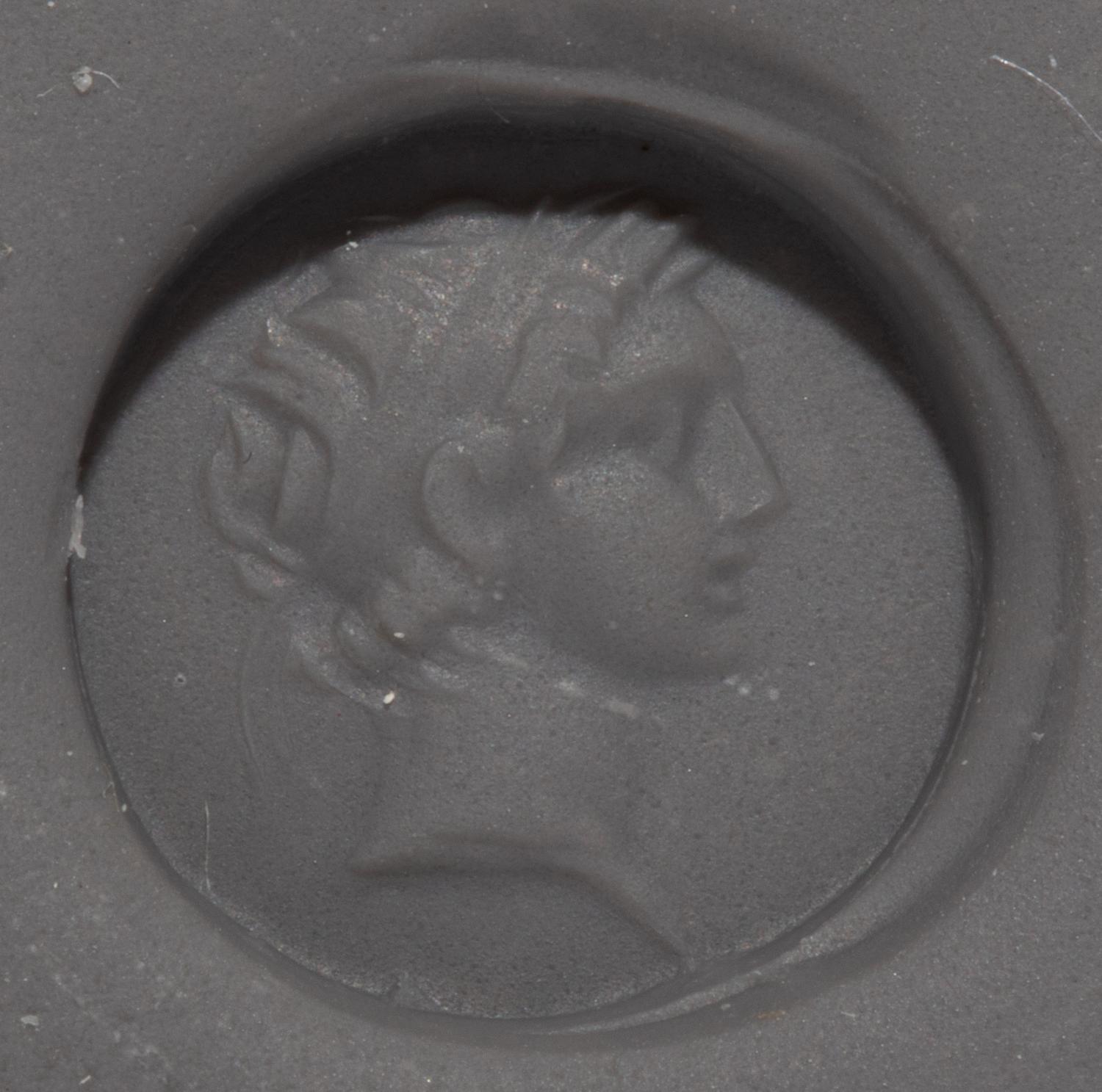 A Hellenistic Amethyst Ring Stone with the Portrait Head of a Seleucid King